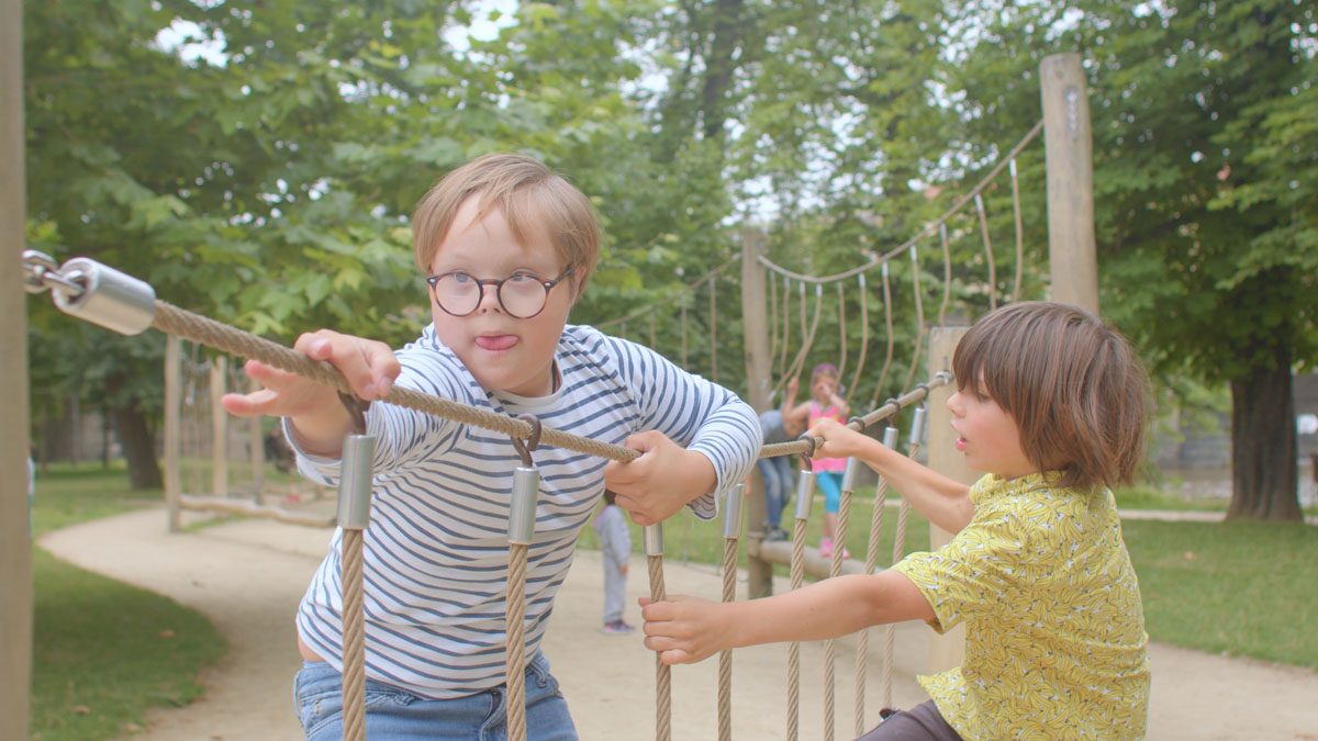 Two children playing in a playground